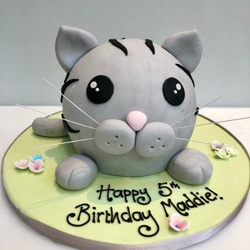 Cake carved to look like a pet cat