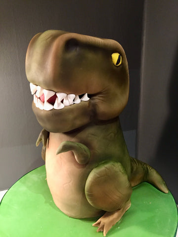 Large T-Rex Dinosaur carved from cake