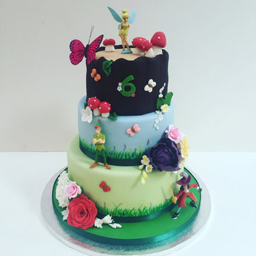 3 tier birthday cake with tinkerbell, peter pan and captain hook