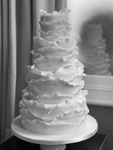 4 Tiered Wedding Cake with a Ruffled Frilled Icing finish