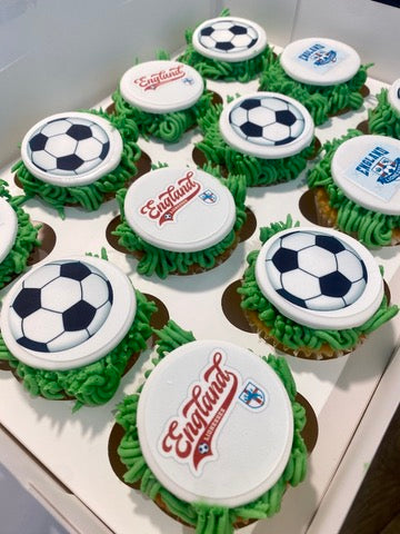 Cupcakes made for england's women's football team with branded logo toppers