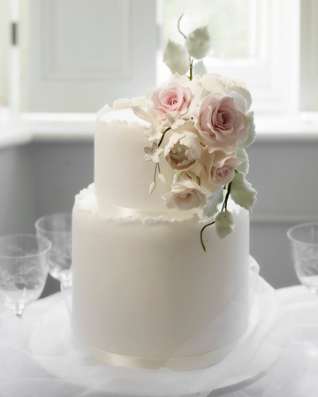 white wedding cake with roses