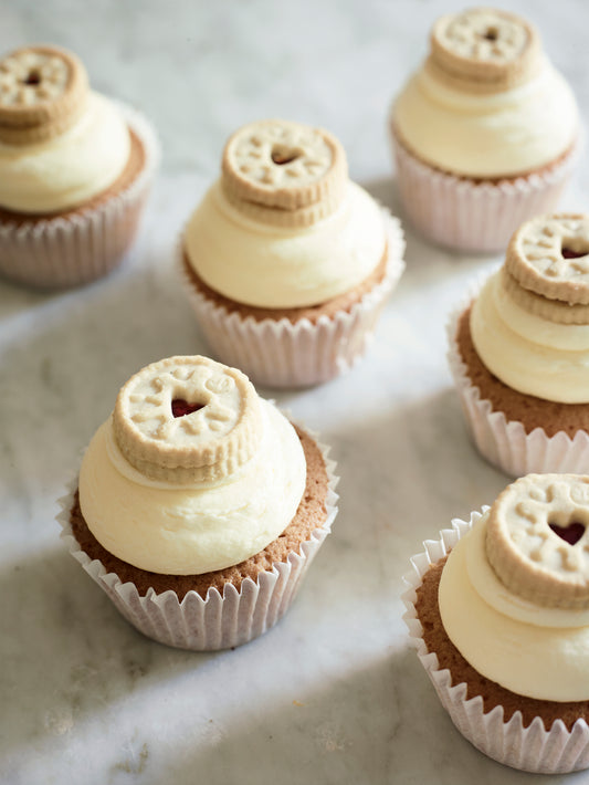 Cupcakes topped with a Jammy Dodger Biscuit