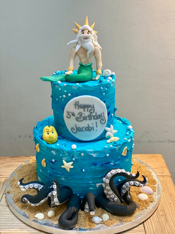 Sea decorated cake wtih king Triton and octopus legs