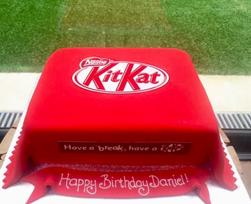 Birthday cake decorated to look like a kitkat