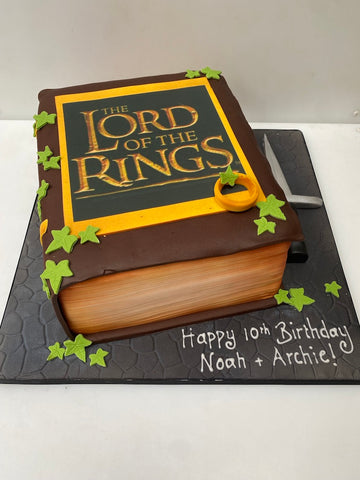 Cake decorated to look like an old book from Lord of the Rings