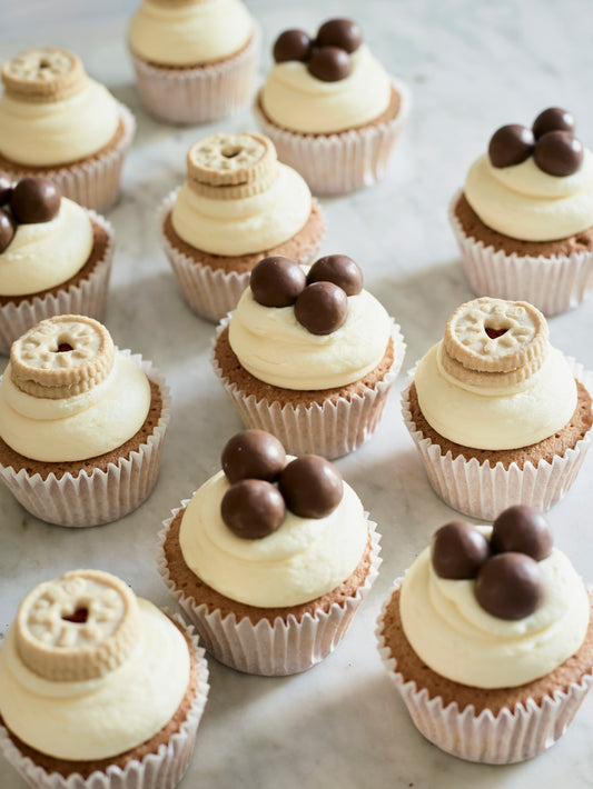 Mixed box of jammy dodger and malteser cupcakes