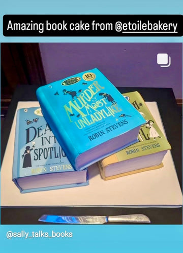 Cakes decorated to look like a stack of books by Robin Stevens for her book launch