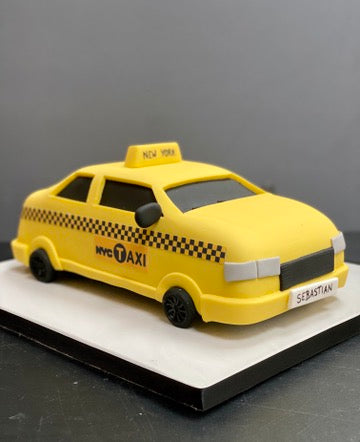cake shaped like a new york taxi