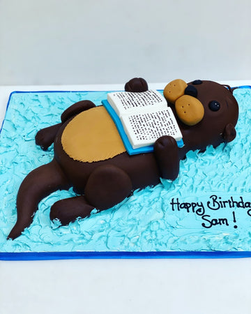 3D otter shaped birthday cake