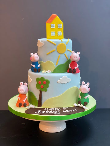 Peppa Pig Themed Birthday cake with mummy pig, daddy pig, peppa and george