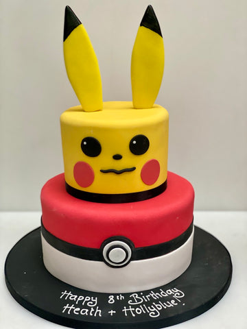 Pikachu amd pokeball pokemon themed children's birthday cake