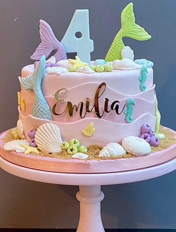 Mermaid cake with pink waves and shells