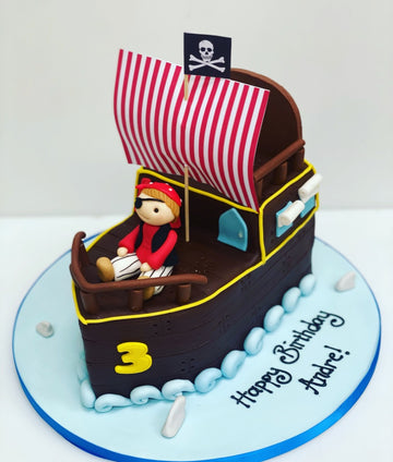 Birthday Cake carved to the shape of a pirate ship