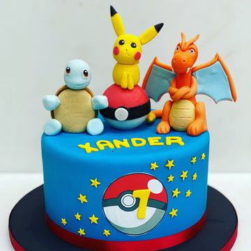 birthday cake with characters from pokemon including pikachu made in london