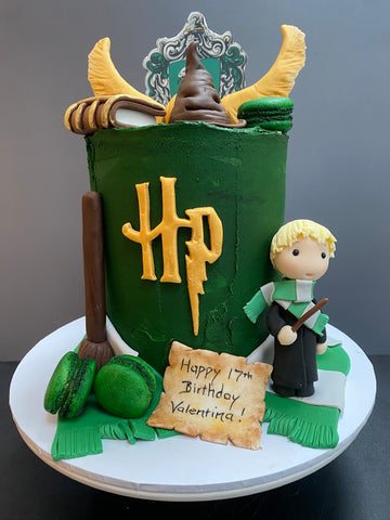 Green harry potter cake with slitherin decorations