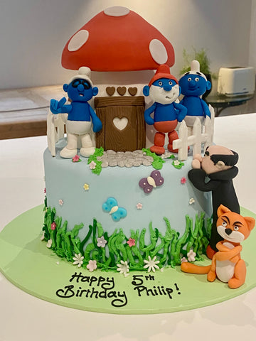 Cake with the smurfs, Gargamel, his cat and their toadstool house