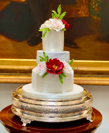 3 tier wedding cake decorated with sugar lace, marble effect icing and sugar peonies and roses