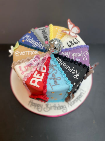 Birthday cake showing all of Taylor Swift's Albums