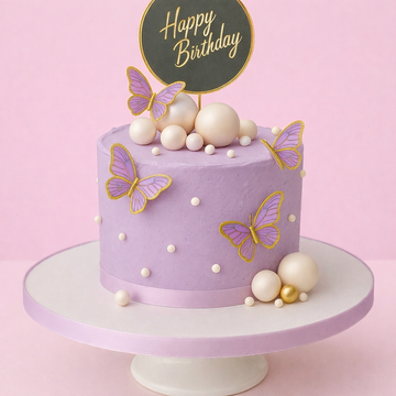 lilac cake with butterflies and balls to decorate