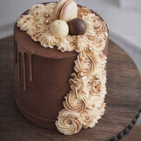 chocolate latte drip cake wtih truffles and macarons delivered in london