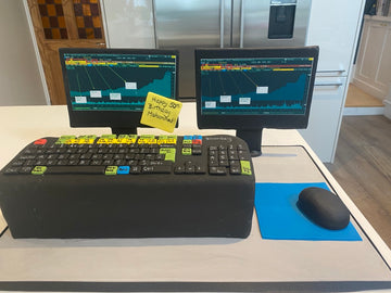 Cake Carved and decorated to look like a computer and two trading screeens
