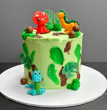 Dinosaur themed green buttercream birthday cake ready to order in london