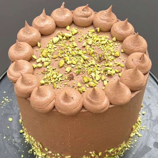 Chocolate cake with pistachio crumb topping like dubai cake delivered london