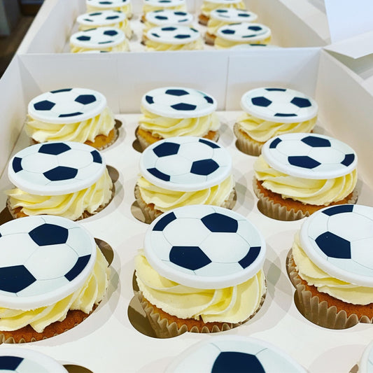 Cupcakes decorated with a football on top