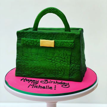 Cake Carved and Decorated to look like a Green Crocodile Hermes Handbag 