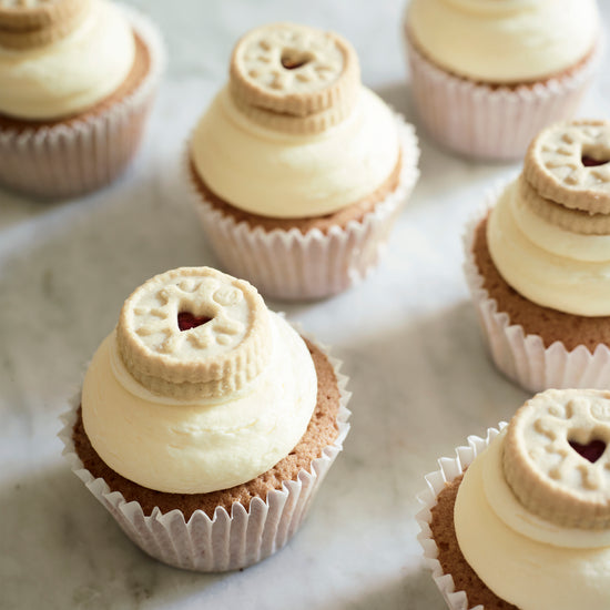 Cupcakes topped with a Jammy Dodger Biscuit