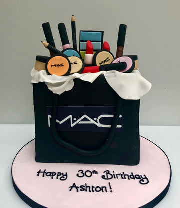 cake decorated to look like a bag of MAC make-up