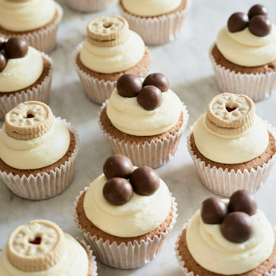 Mixed box of jammy dodger and malteser cupcakes