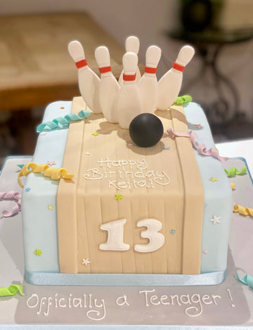 Pastel coloured bowling themed birthday cake