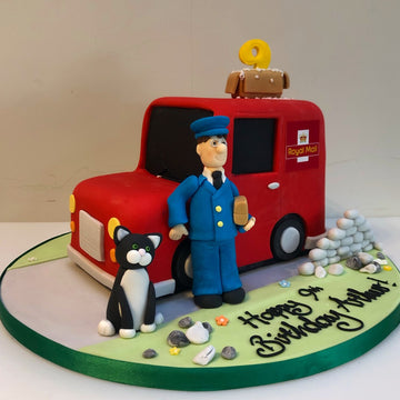 Cake carved and decorated to look like postman pat's van, a sugar version of him and his cat next to the van delivered to london addresses