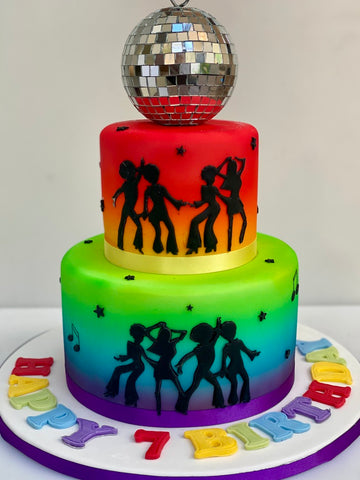 Colorful birthday cake with disco ball and silhouettes of people dancing on a white background