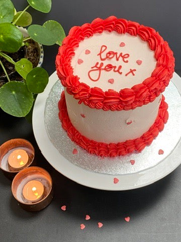 Red and pink piped valentine cake delivered in London