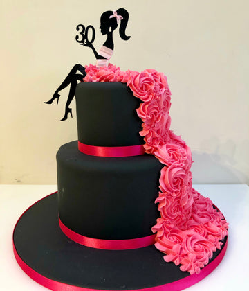 2 tier cake with Silhouette Lady in ruffle dress cake made from buttercream roses