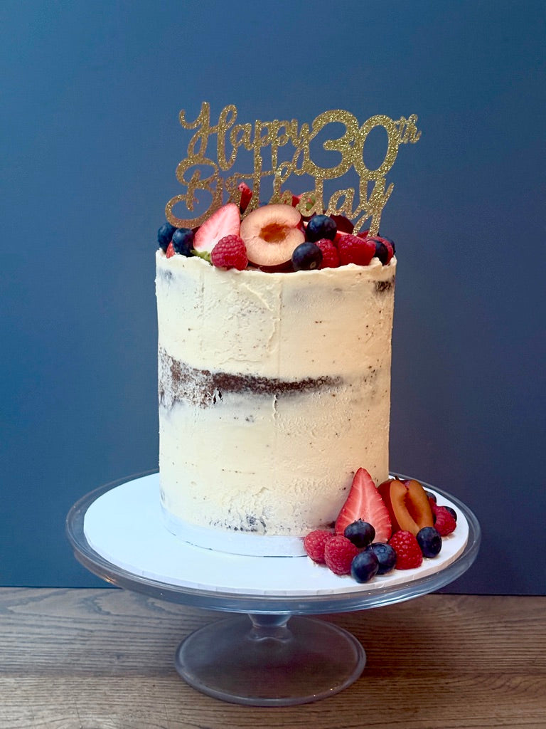 Tall semi naked cake with fruit for delivery across london