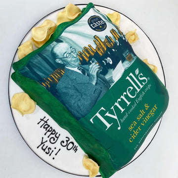 Cake carved and decorated to look like a bag of crisps
