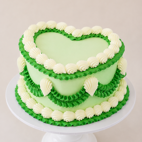 green and white lambeth piping heart shaped cake delivered in london