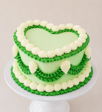 green and white lambeth piping heart shaped cake delivered in london