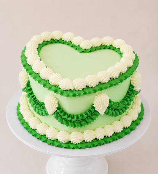 green and white lambeth piping heart shaped cake delivered in london