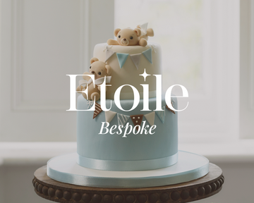 Birthday cake london, a cake with teddies and bunting made using etoile bakery's bespoke service